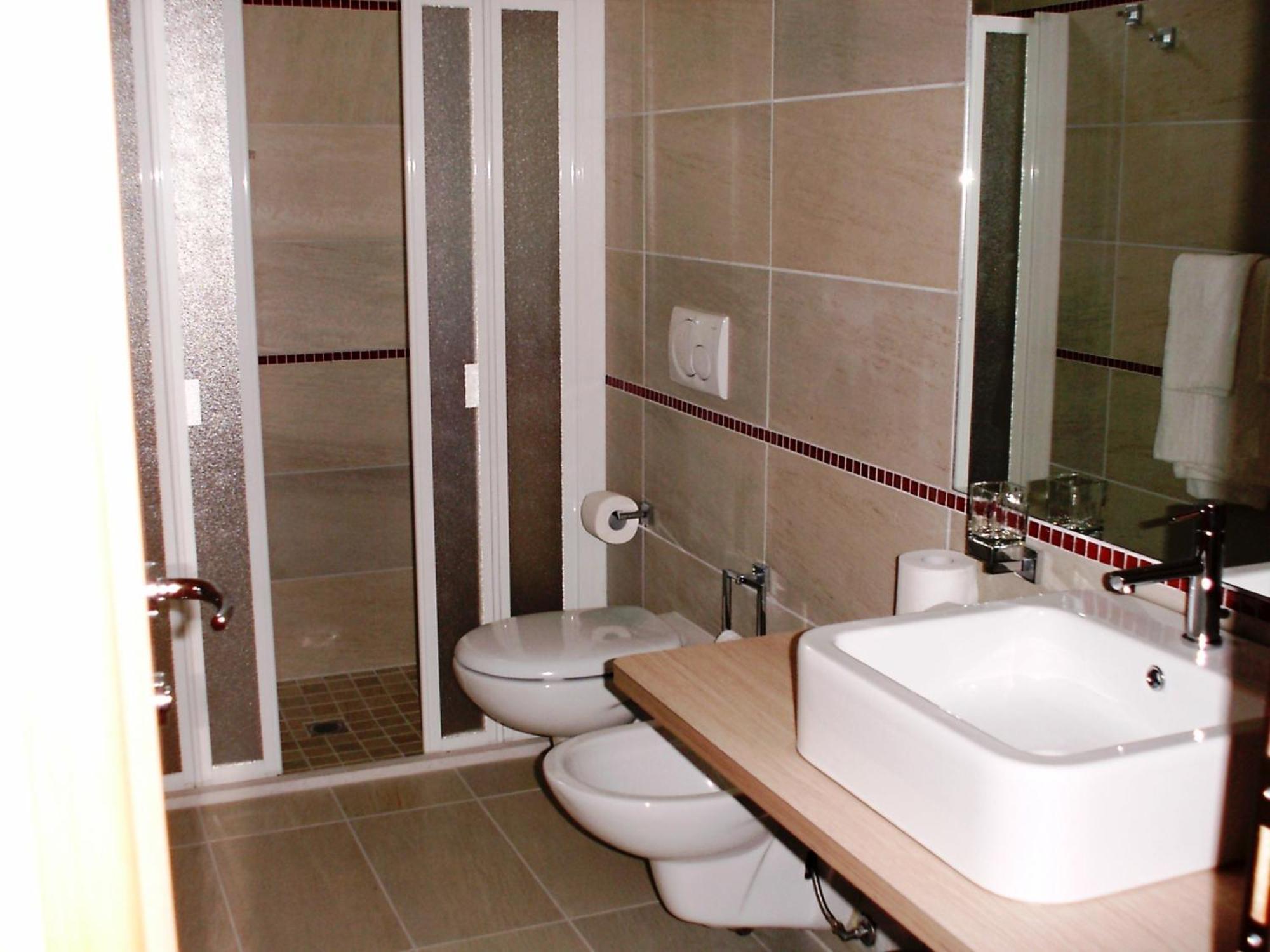 Hotel Capitol San Mauro Mare Номер фото